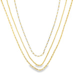 Modern triple layer necklace with paperclip, baguette and beaded chains. Minimalist layered jewelry available in gold or silver. Perfect for everyday wear.