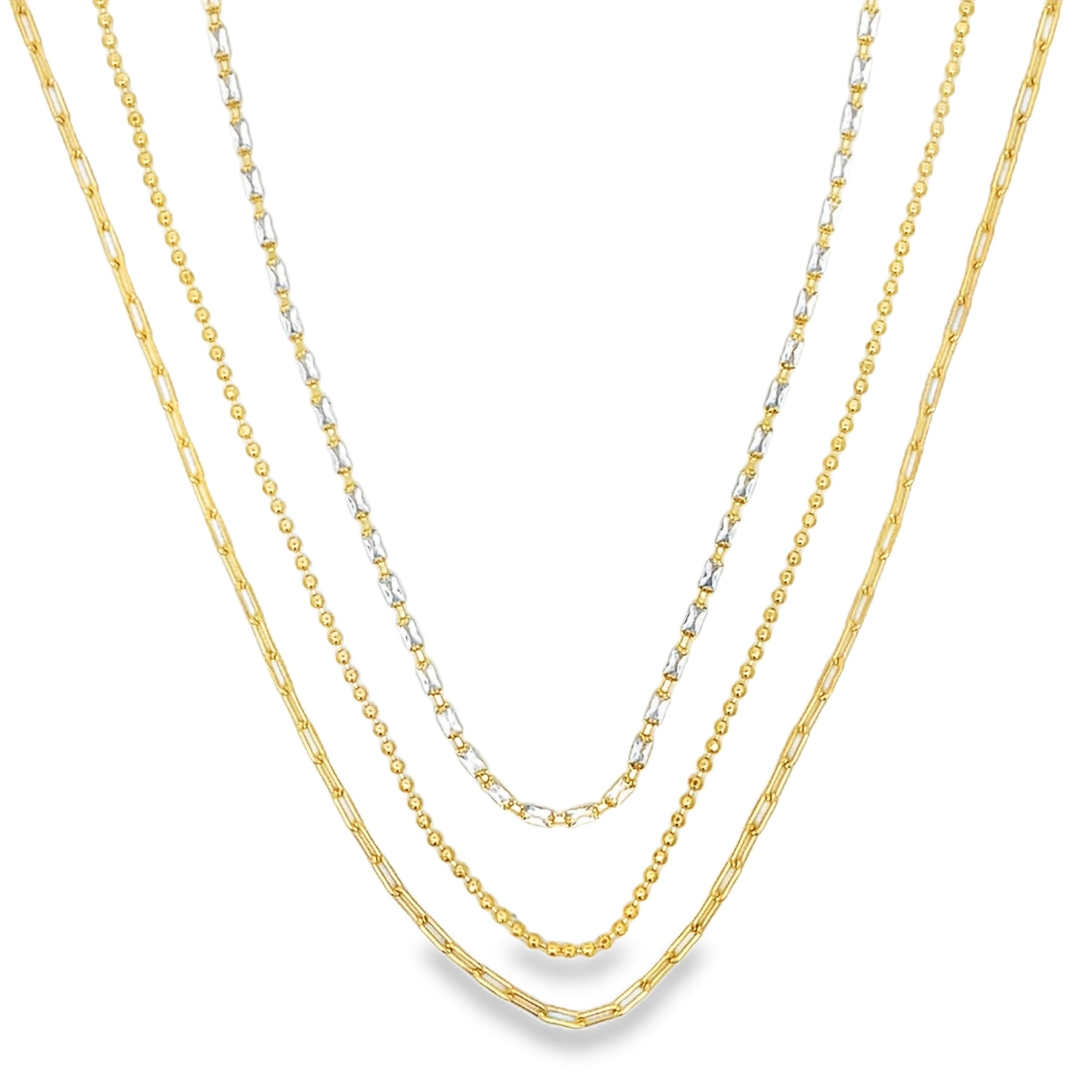 Modern triple layer necklace with paperclip, baguette and beaded chains. Minimalist layered jewelry available in gold or silver. Perfect for everyday wear.