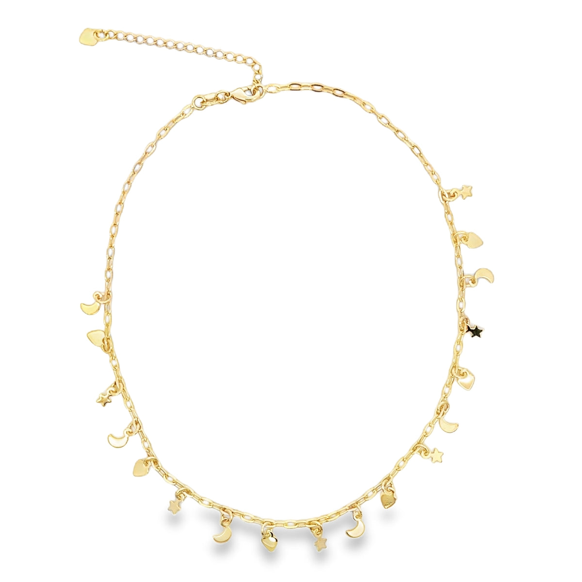 A delicate gold charm necklace sparkles against a plain white background, featuring dangling celestial charms shaped like tiny stars, moons, and hearts.