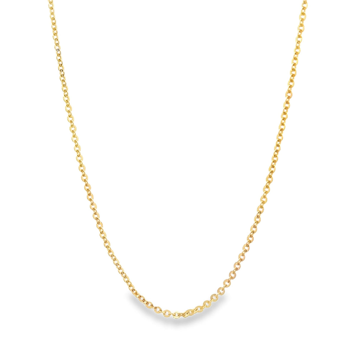 A delicate gold chain necklace drapes in a smooth curve against a clean white background.