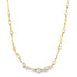 A delicate gold chain necklace sparkles with a variety of mixed-cut crystal and diamond stations against a white background.