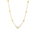 A delicate gold chain necklace sparkles against a clean white background, featuring evenly spaced golden bead stations along its length.