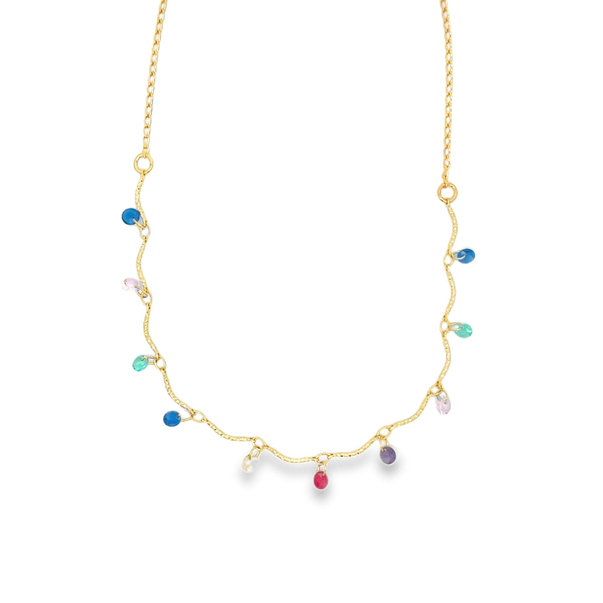 A delicate gold chain necklace dangles multicolored gemstone charms against a plain white background.