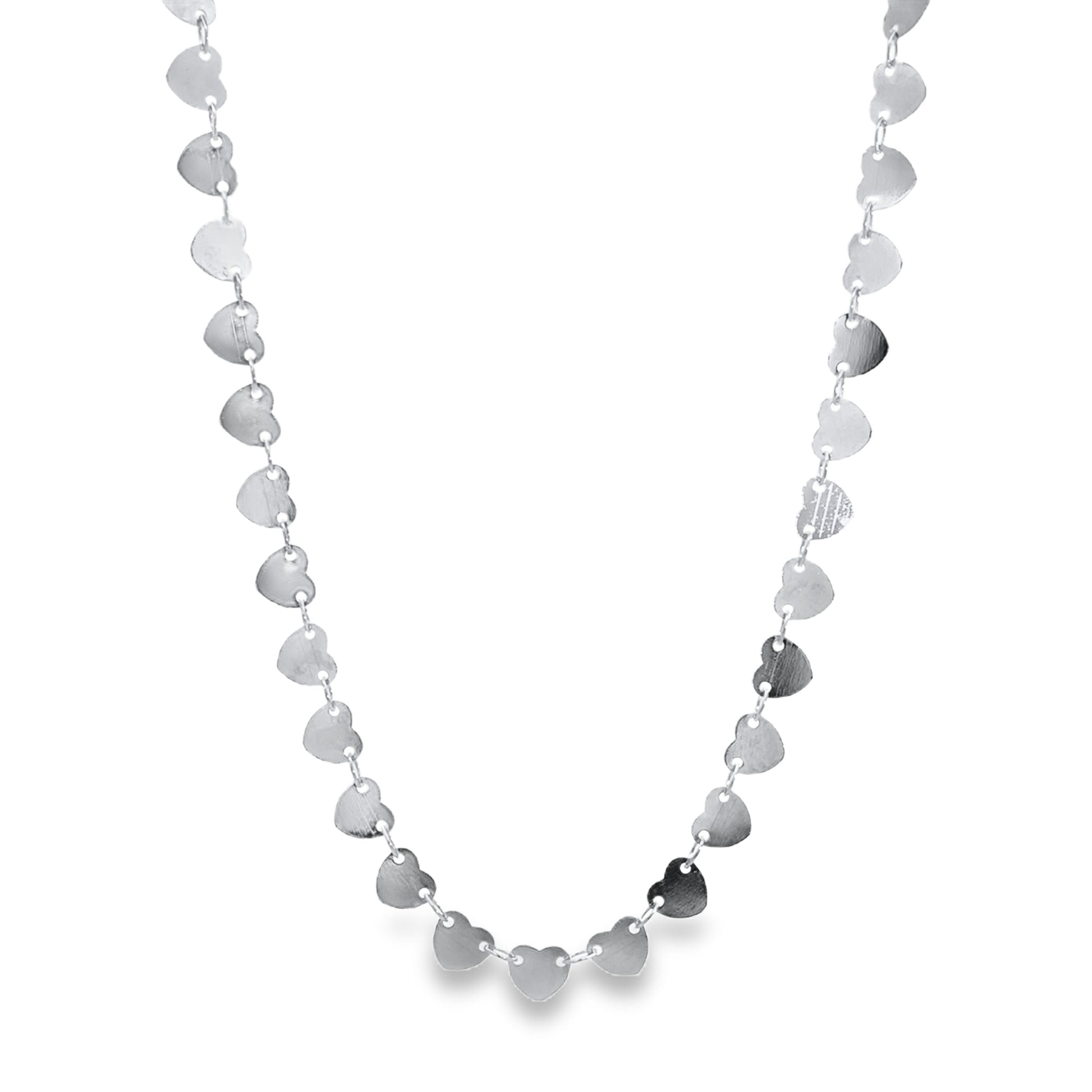 A delicate silver necklace features a continuous chain of small, interlocking metal hearts against a clean white background.