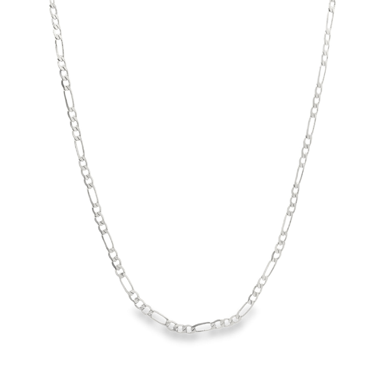 A delicate silver Figaro chain necklace drapes against a clean white background.