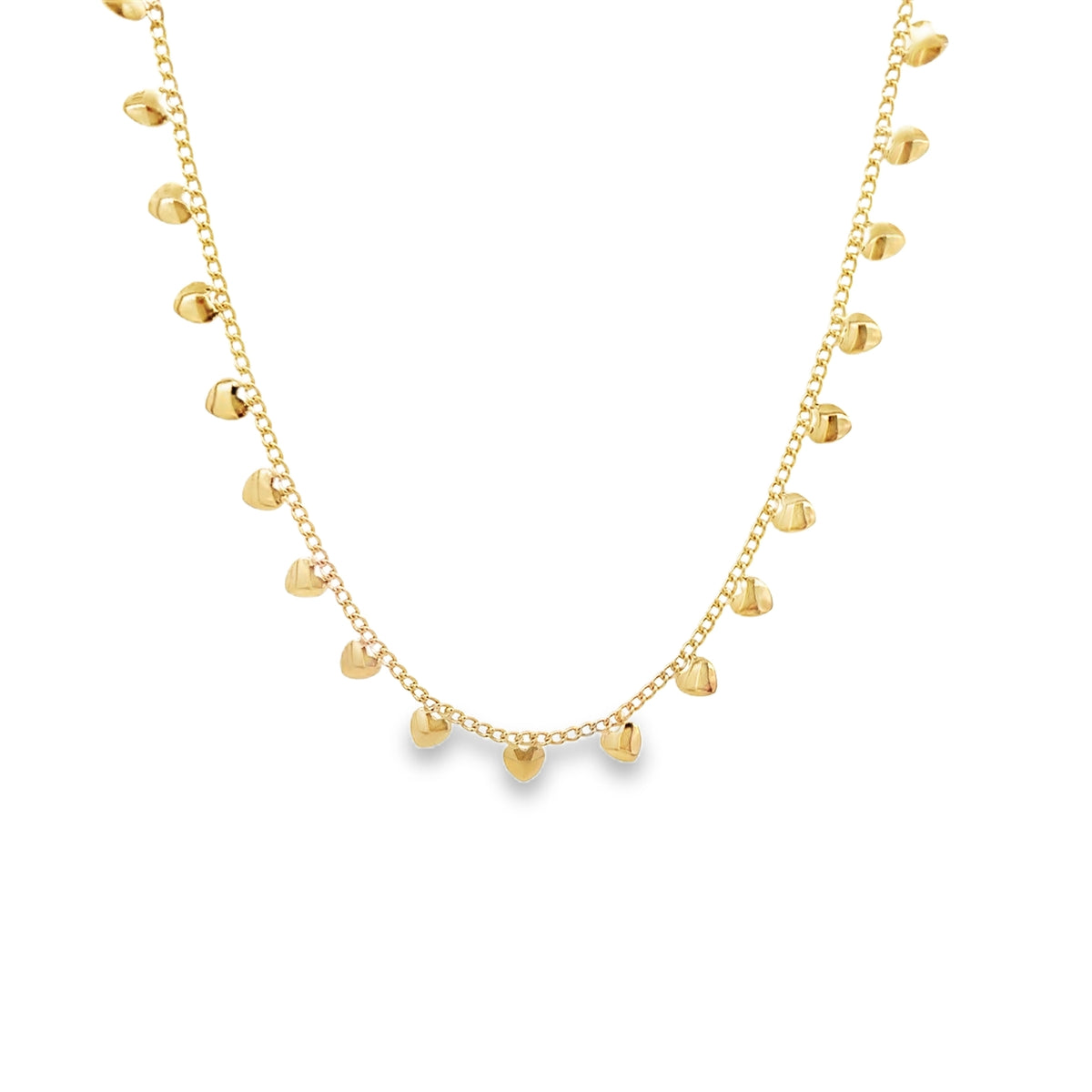 A delicate gold chain necklace dangles charming little heart charms along its length against a clean white background.