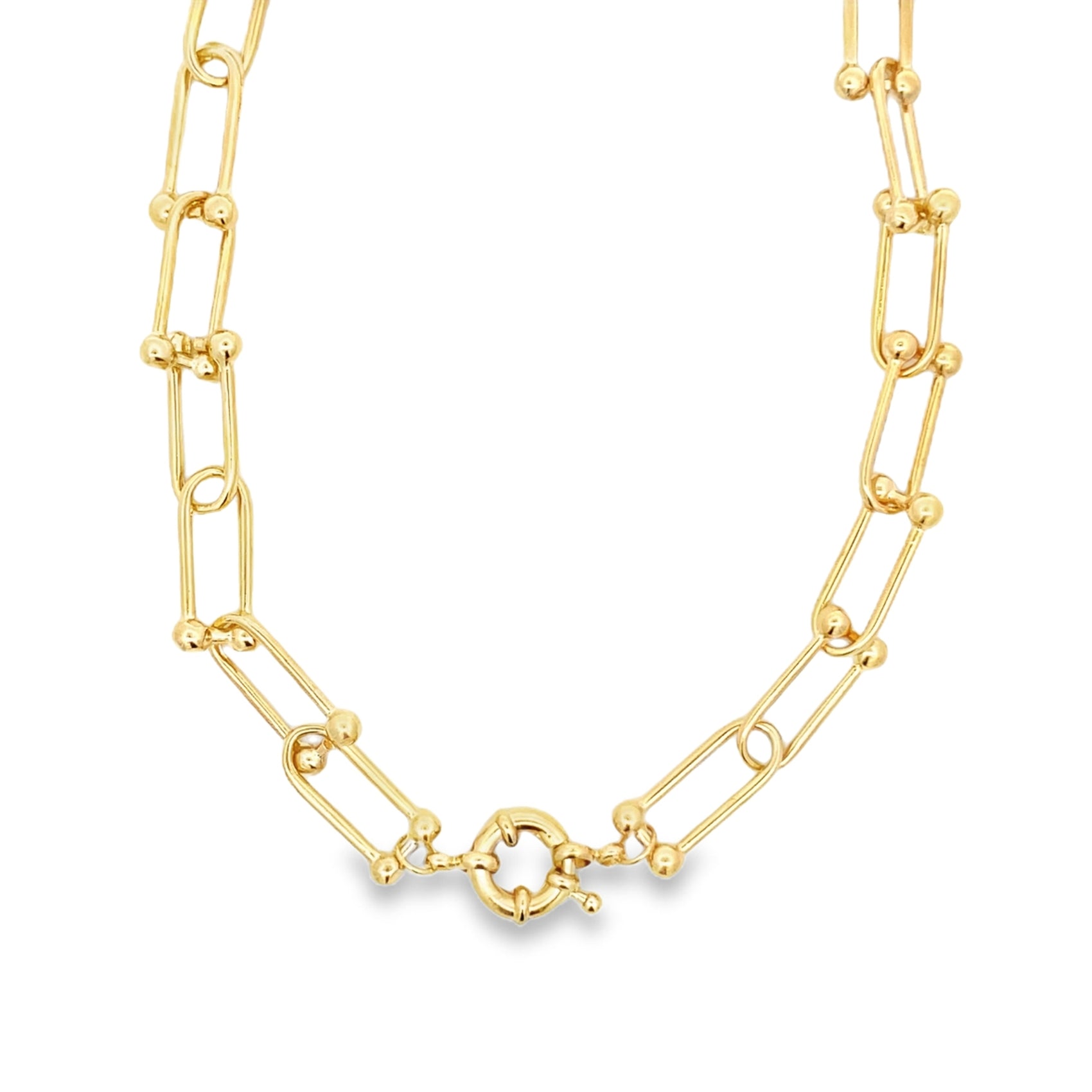A glossy gold paperclip link necklace features delicate ball accents and a secure round clasp centered against a plain white background.