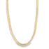 A thick, intricately woven gold chain necklace hangs against a clean white background.