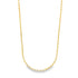 A delicate yellow gold box chain necklace rests against a clean white background.