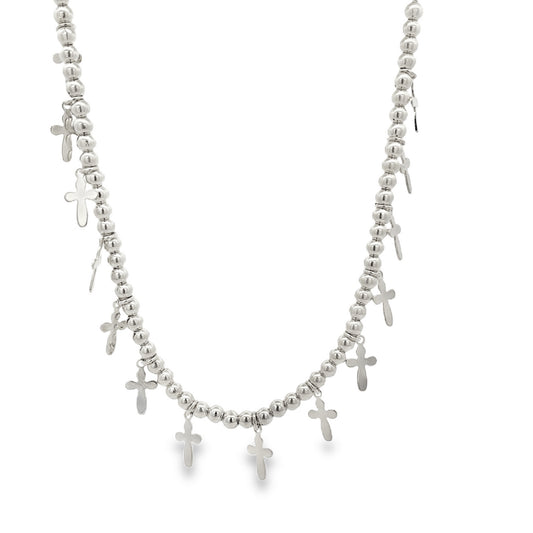 A silver beaded charm necklace displays multiple hanging cross pendants against a clean white background.