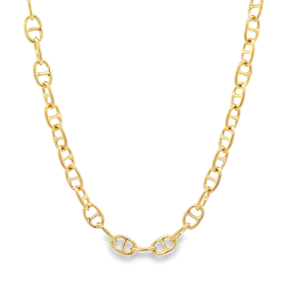 A polished gold mariner link chain necklace rests in a gentle curve against a clean white background.
