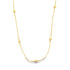 A delicate gold box chain necklace features evenly spaced small golden beads against a white background.