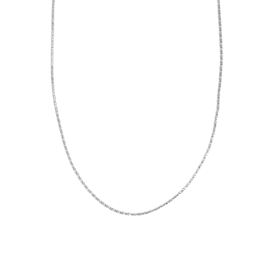 A delicate silver chain necklace drapes in a smooth curve against a clean white background.