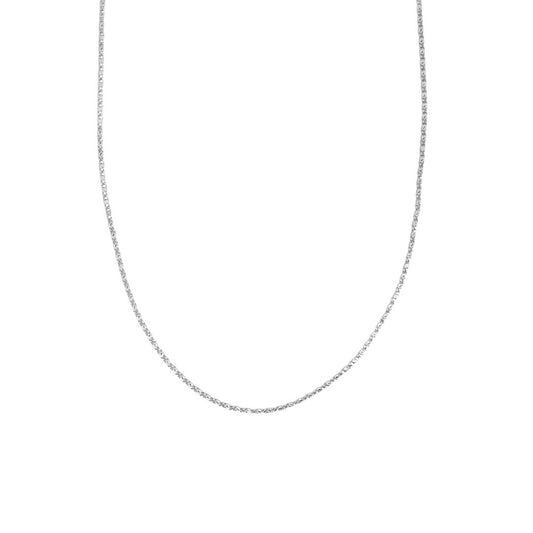 A delicate silver chain necklace drapes in a smooth curve against a clean white background.