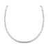 A polished silver chain necklace curves gracefully against a plain white background.