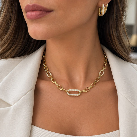 Thick Oval Paperclip Necklace featuring pave CZ geometric links. Available in 18K Gold Filled and Rhodium Filled for a modern, luxurious finish.