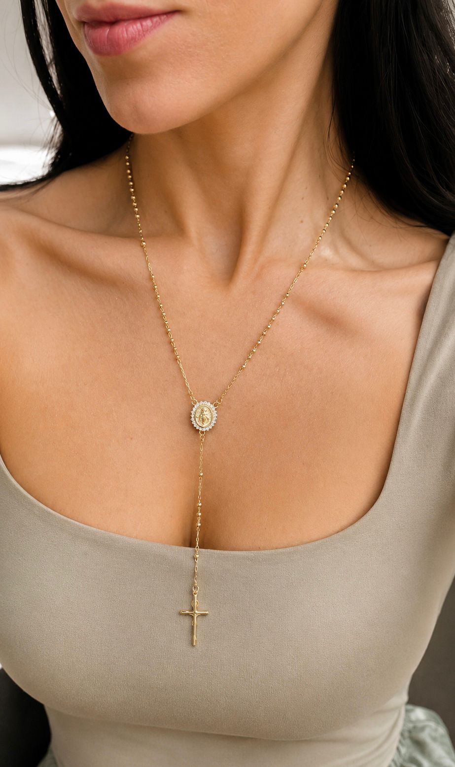 Elegant 18K gold filled rosary necklace featuring a Virgin Mary medal and cross pendant. Available in multiple sizes and thickness options for timeless everyday wear.