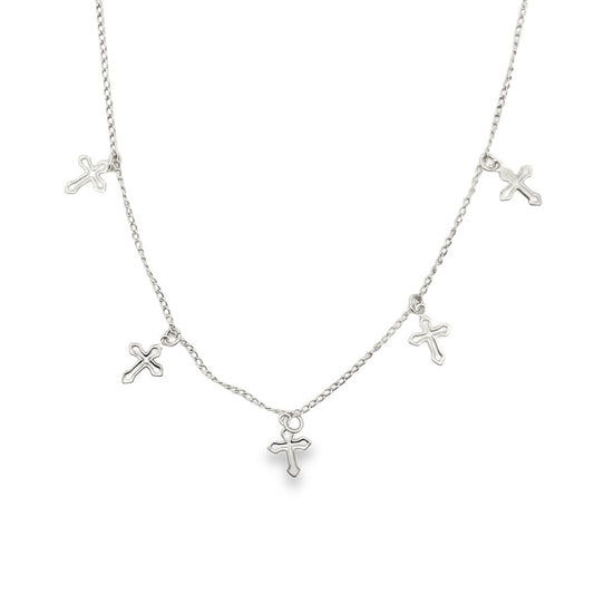 A delicate silver chain necklace features multiple small cross charms dangling gracefully against a plain white background.