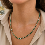 Elegant 3mm CZ tennis necklace with alternating colored and clear bezel stones. Available in gold filled and silver-tone finishes. Perfect for layering or everyday luxury styling.