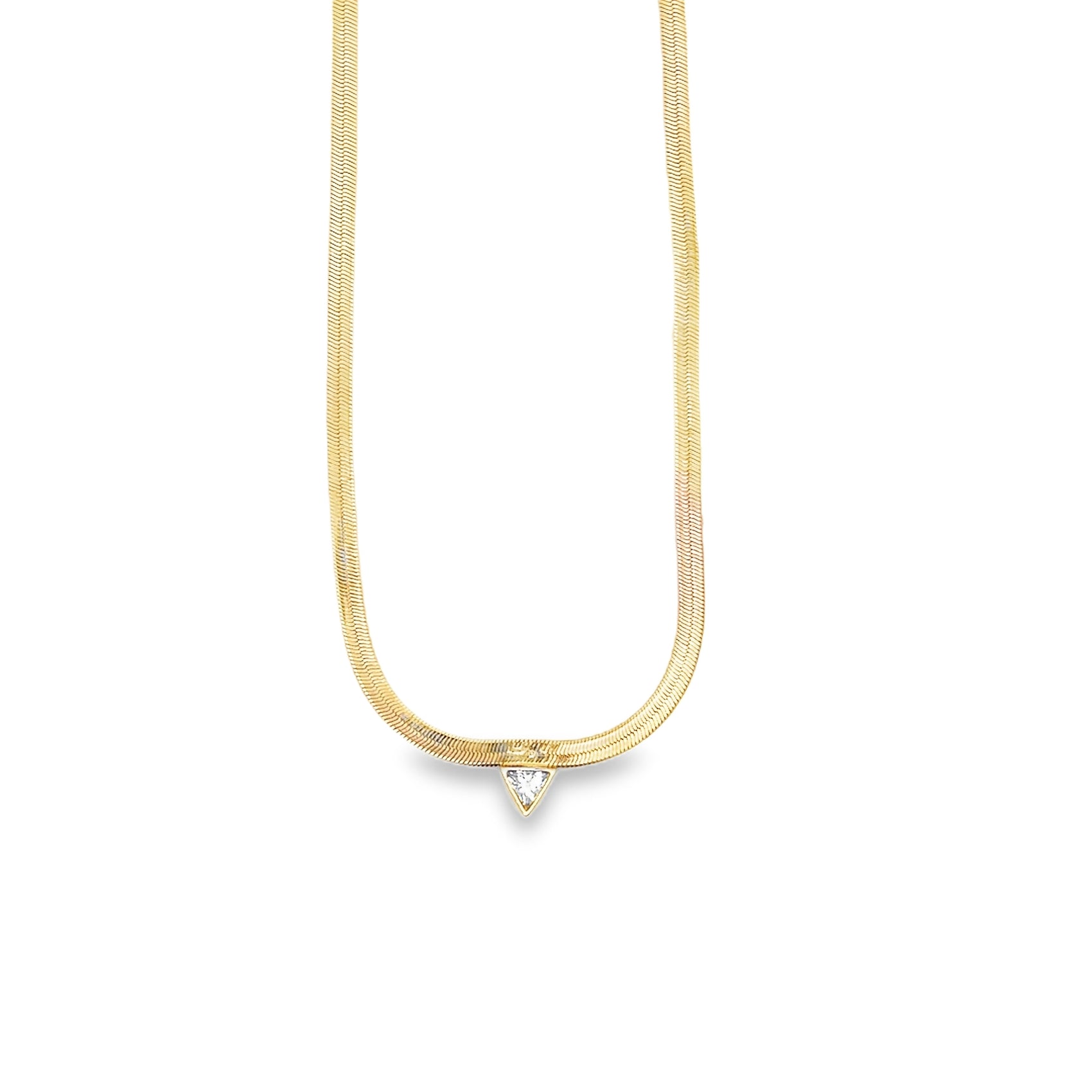 A gold herringbone chain necklace features a sparkling trillion-cut diamond pendant centered at the bottom against a plain white background.