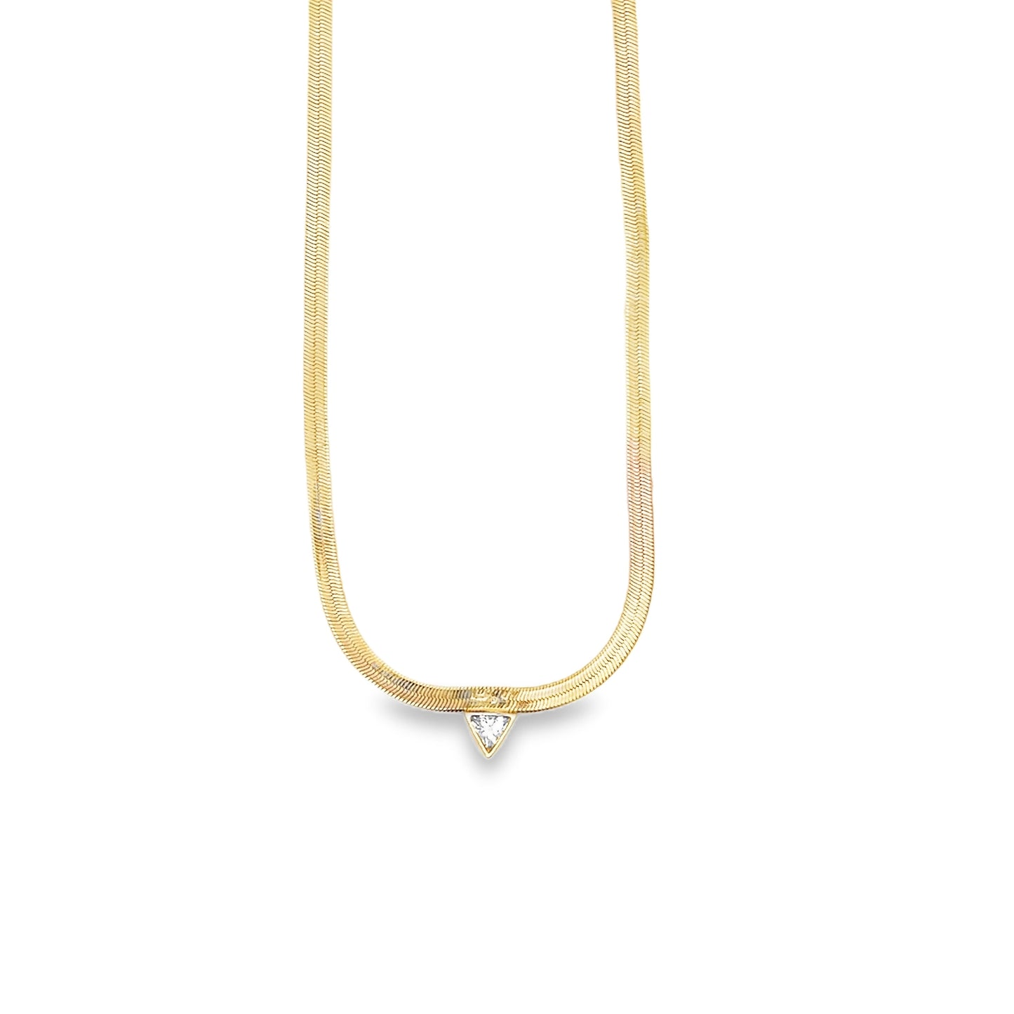 A gold herringbone chain necklace features a sparkling trillion-cut diamond pendant centered at the bottom against a clean white background.