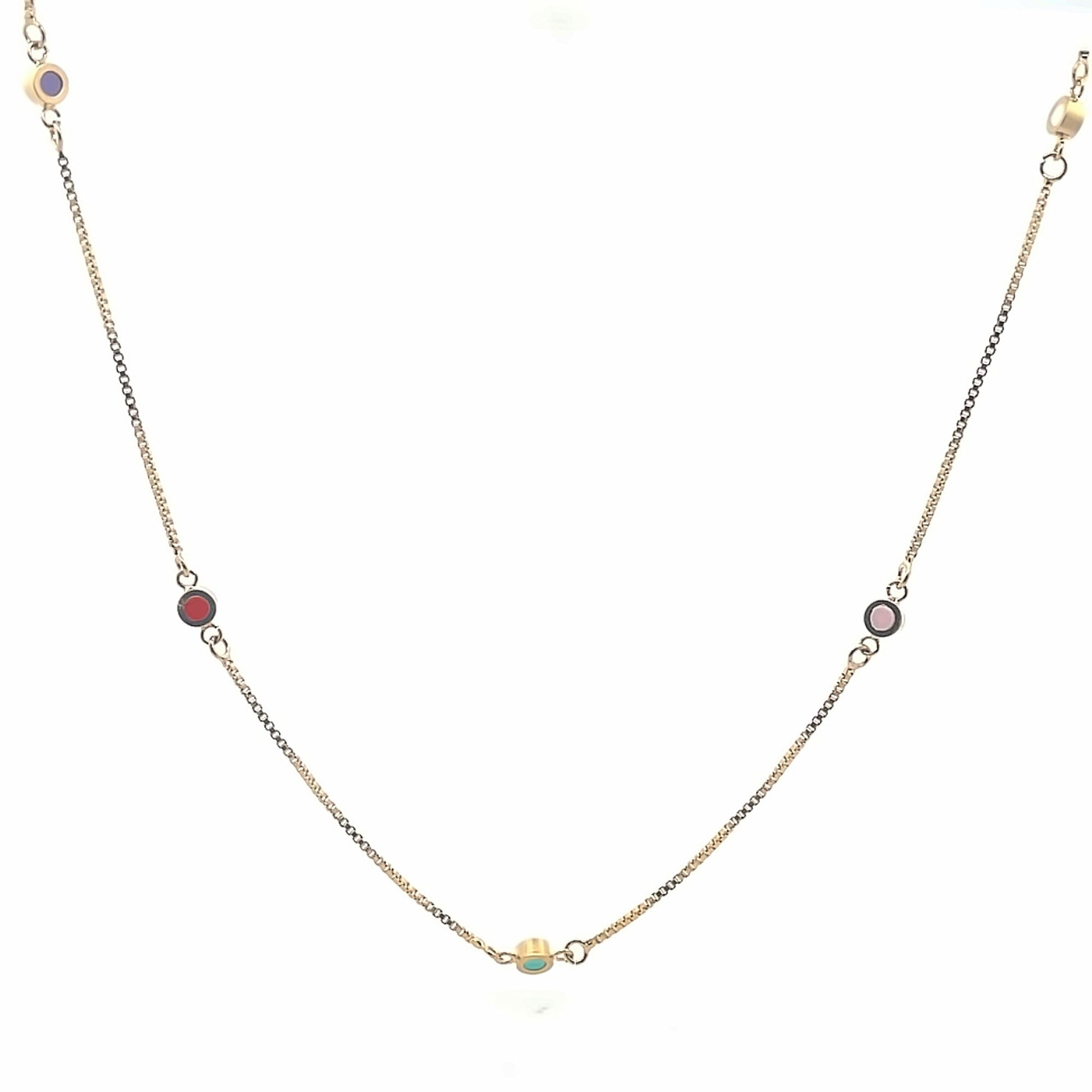 A delicate gold chain necklace features scattered colorful enamel stations against a clean white background.