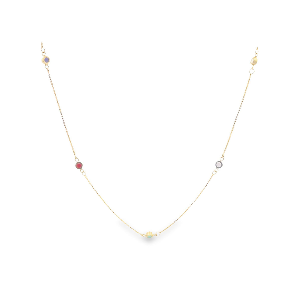 A delicate gold chain necklace sparkles against a plain white background, featuring small colorful gemstone stations spaced along its length.