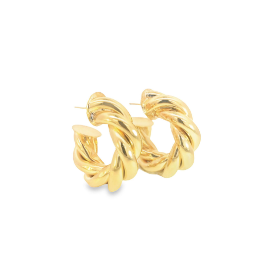 A pair of thick, polished gold twisted hoop earrings rests against a clean white background.