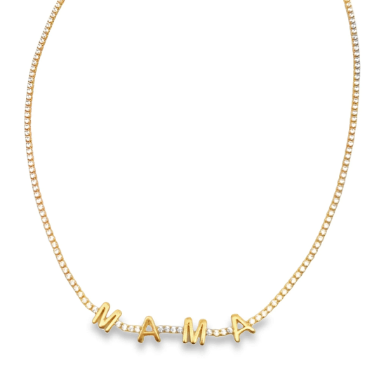 A delicate gold tennis necklace features sparkling pavé diamonds and spells out "MAMA" in gold block letters.
