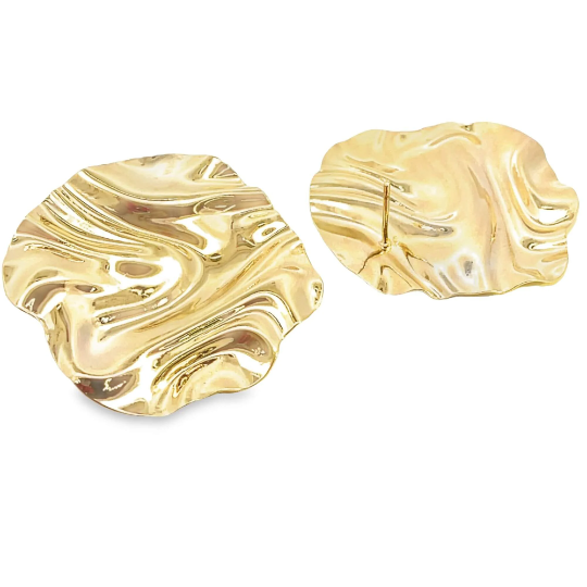 A pair of glossy, irregular gold-plated stud earrings gleams against a white background.