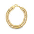 A thick, polished gold chain bracelet curves against a white background, featuring a secure lobster clasp closure.