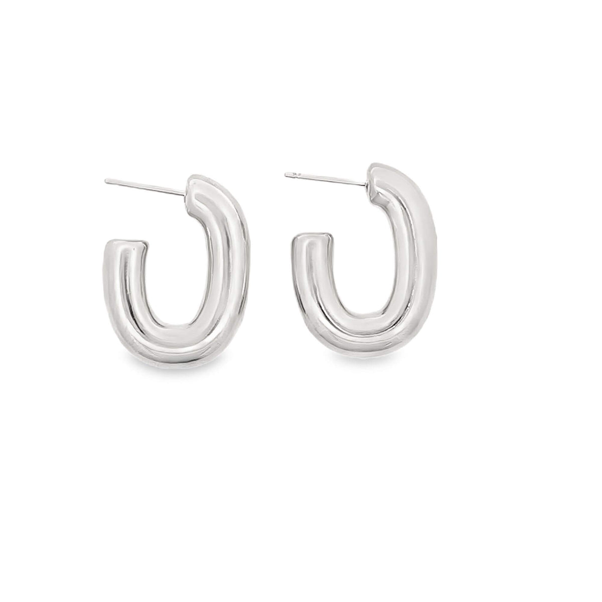 A pair of glossy, silver-toned chunky hoop earrings rests against a clean white background.