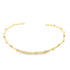 A sleek gold cuff bracelet features delicate, evenly spaced sphere accents along its open band against a plain white background.