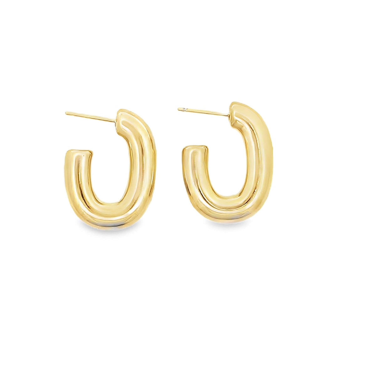 A pair of polished gold chunky U-shaped hoop earrings rests against a clean white background.