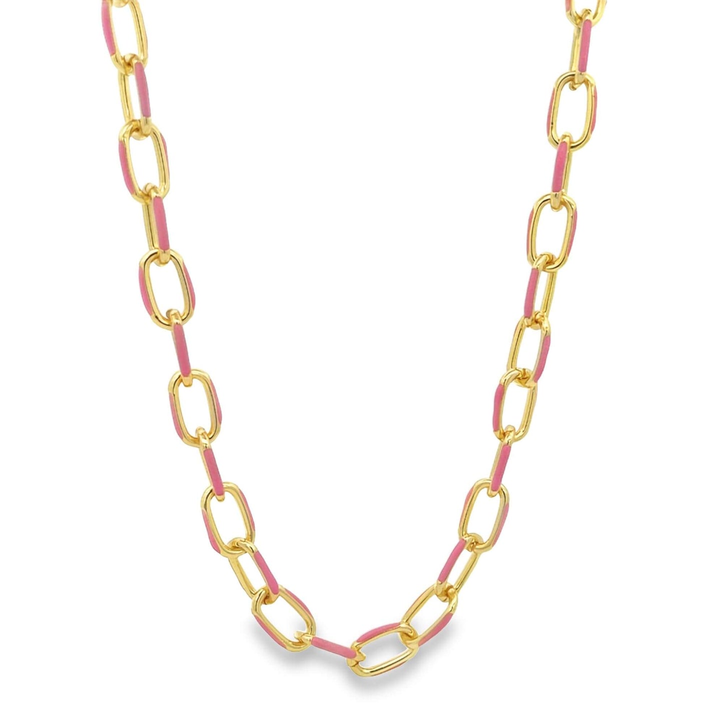 A gold chain necklace features alternating chunky links accented with vibrant pink enamel against a clean white background.