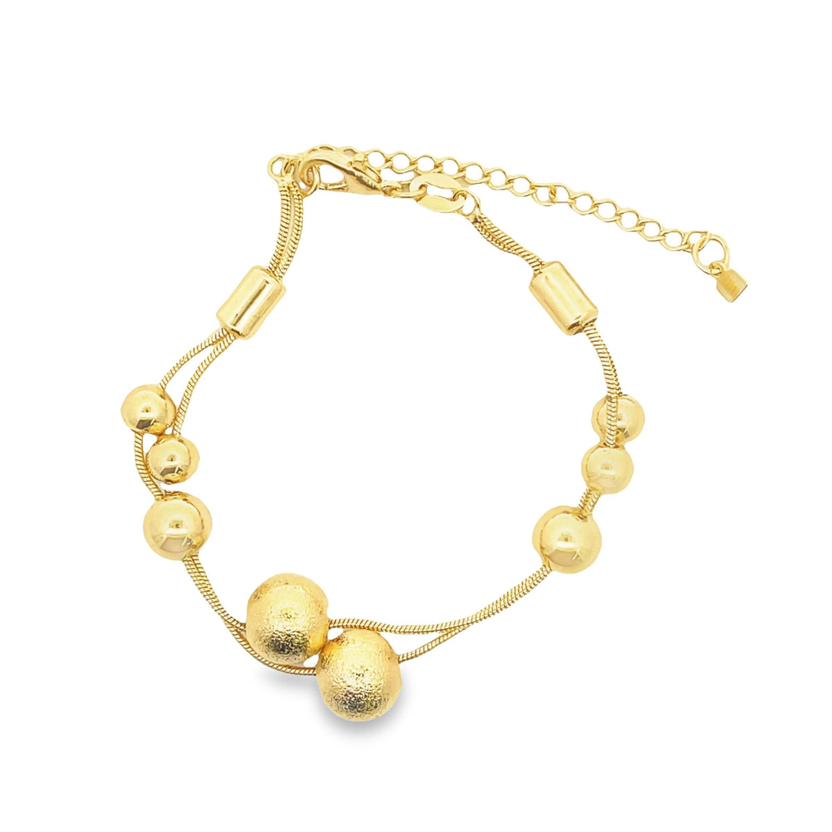 A shiny gold double-strand bracelet showcases textured bead charms and a delicate adjustable chain against a clean white background.