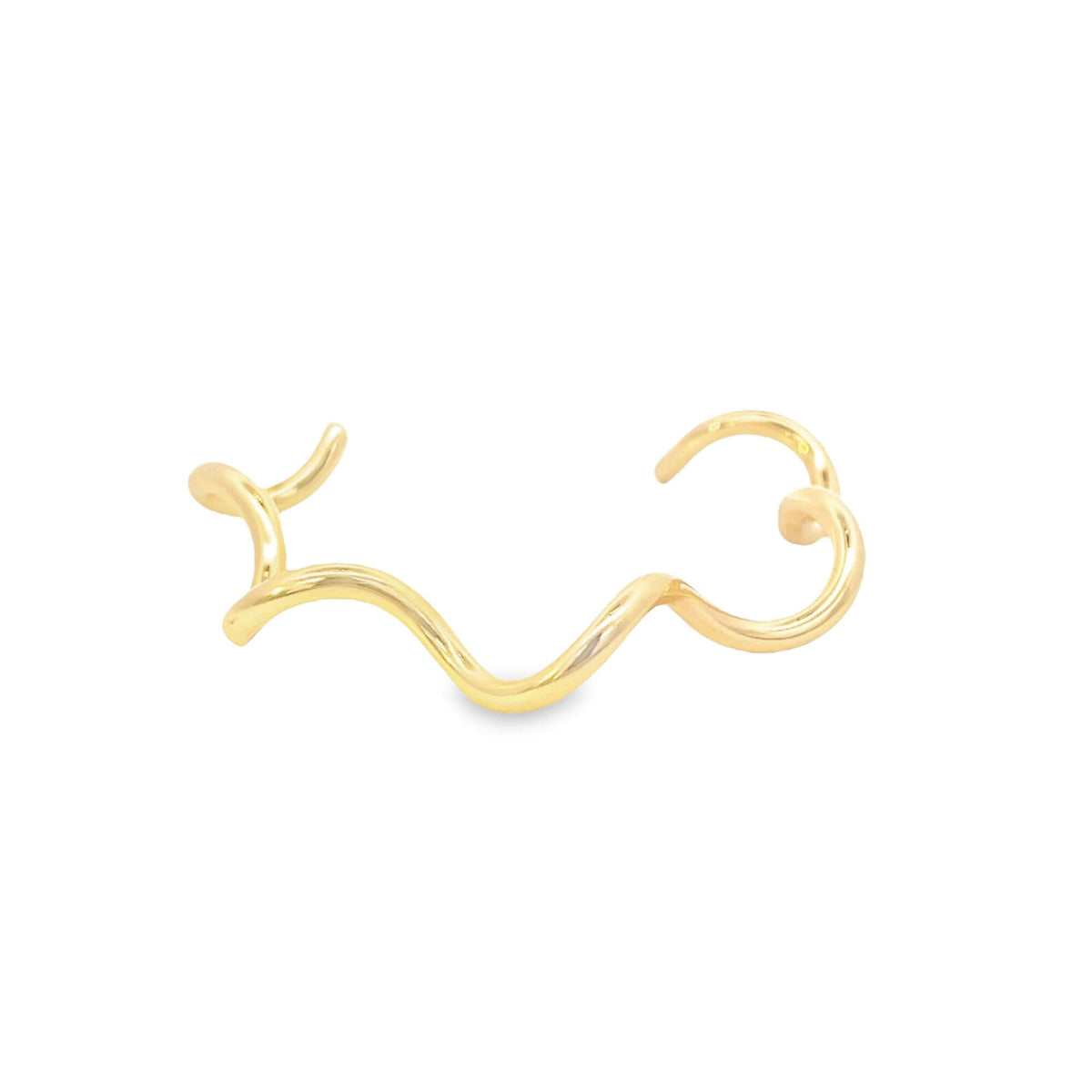 A polished yellow gold ear cuff features a unique wave design against a plain white background.