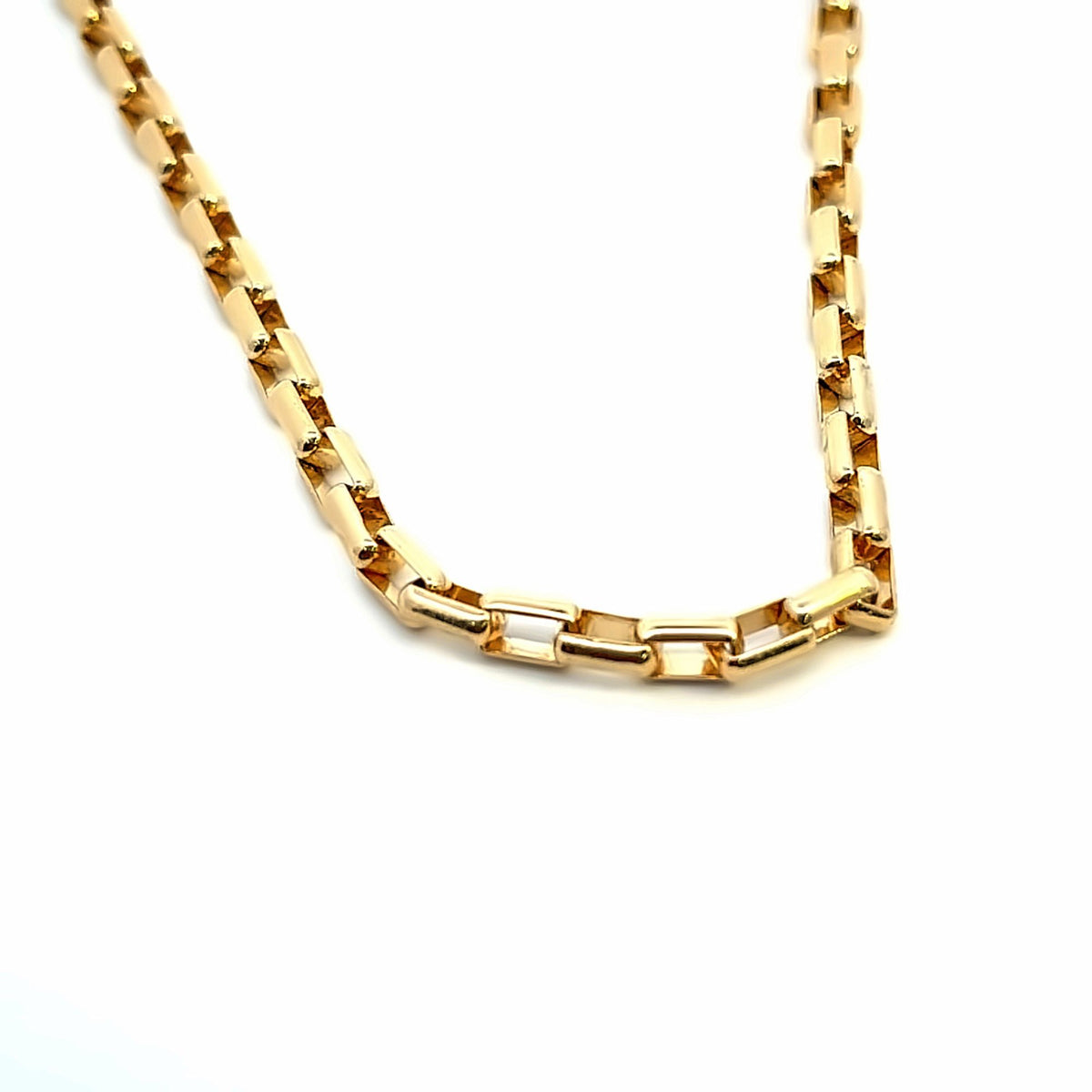 A gleaming gold link chain necklace is displayed against a clean white background.