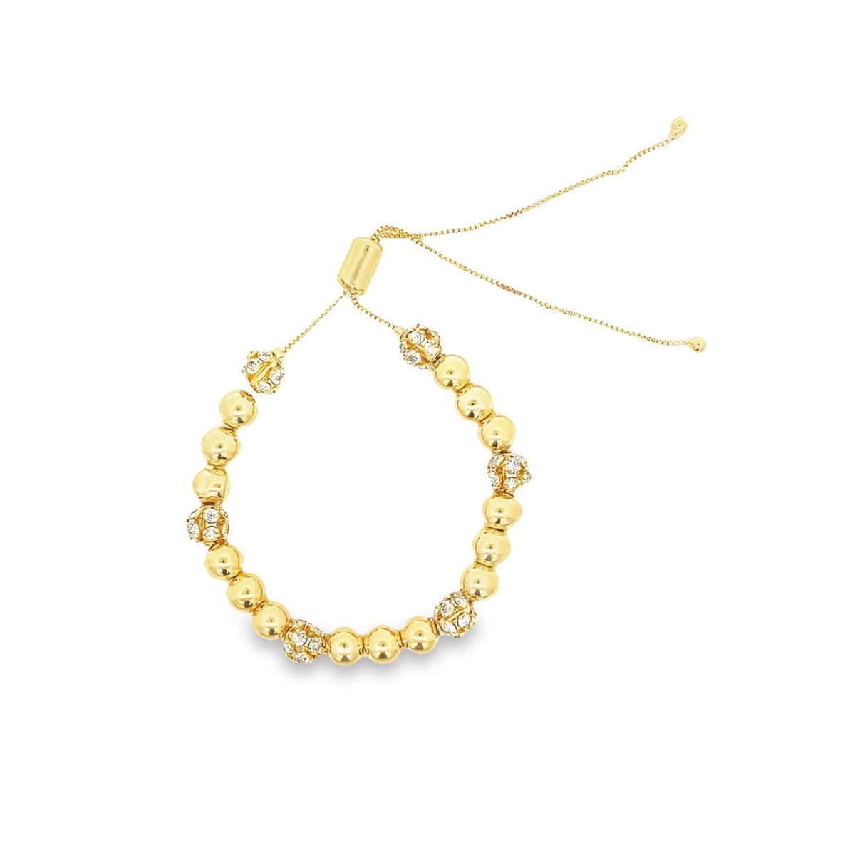 A gold beaded bolo bracelet features alternating smooth spherical beads and sparkling pave-set crystal accent balls on an adjustable sliding chain.