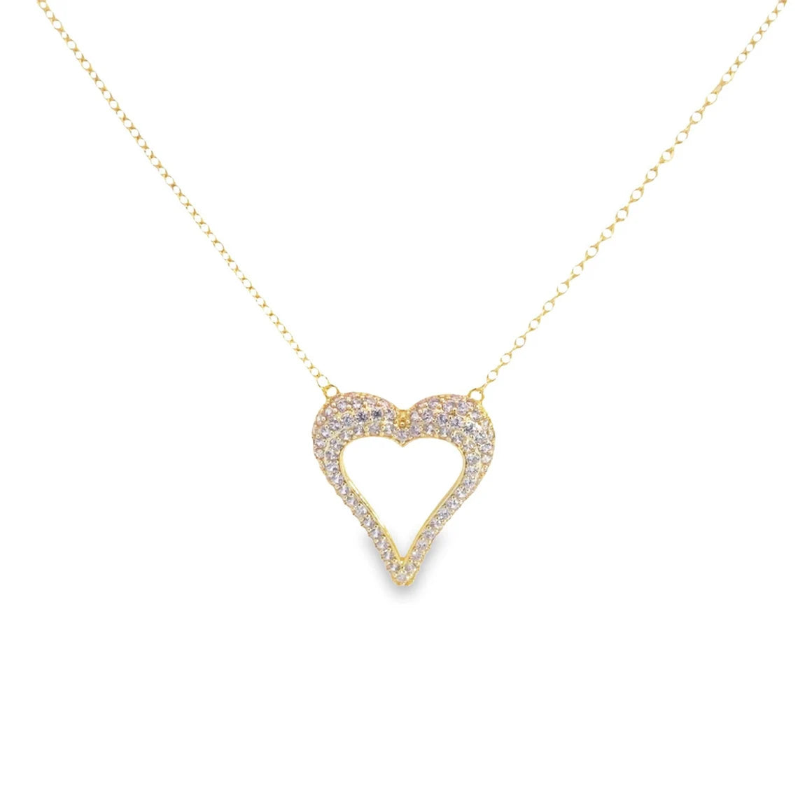 A delicate gold chain holds a sparkling, crystal-pave heart pendant against a clean white background.