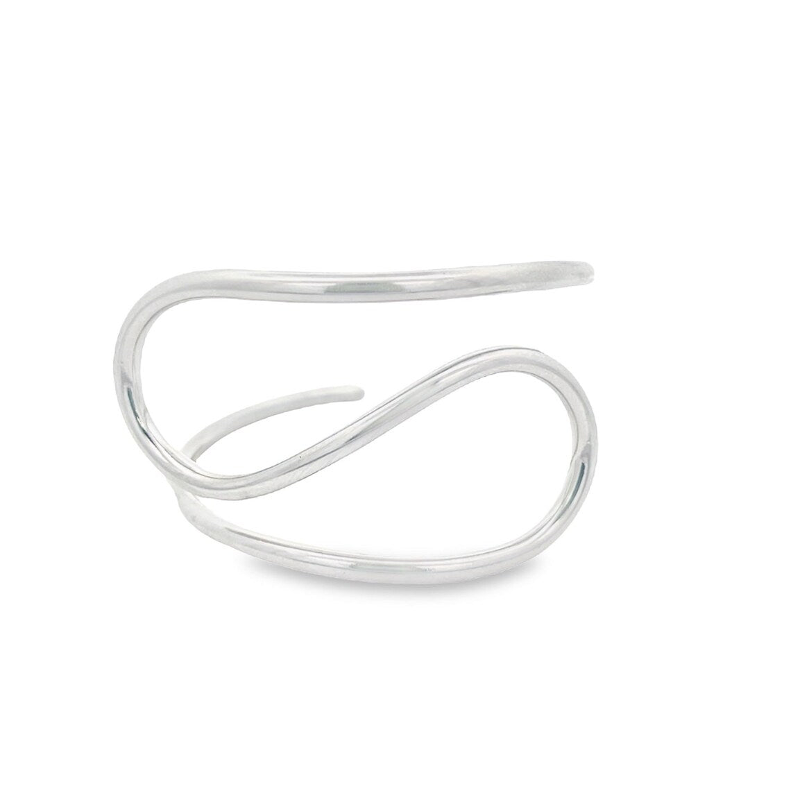 A sleek silver ear cuff features a minimalist, flowing wave design against a clean white background.