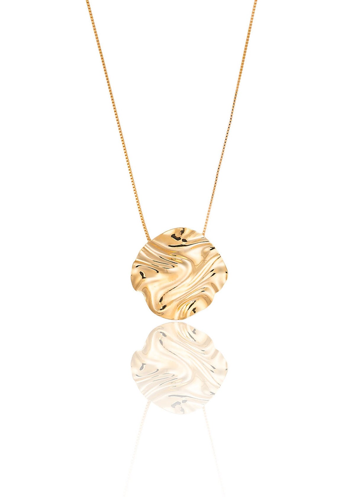 A delicate gold chain necklace hangs against a white background, featuring a glossy, organically shaped gold pendant with a rippled, wavy texture.