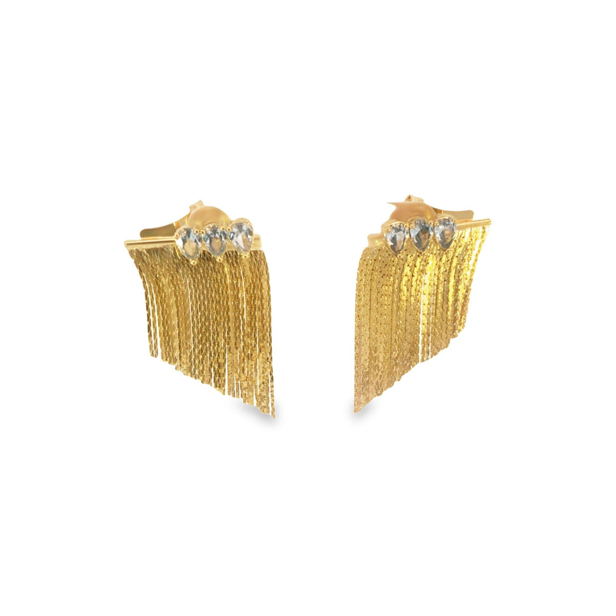 A pair of gold tassel earrings feature a row of sparkling cubic zirconia stones at the top against a plain white background.