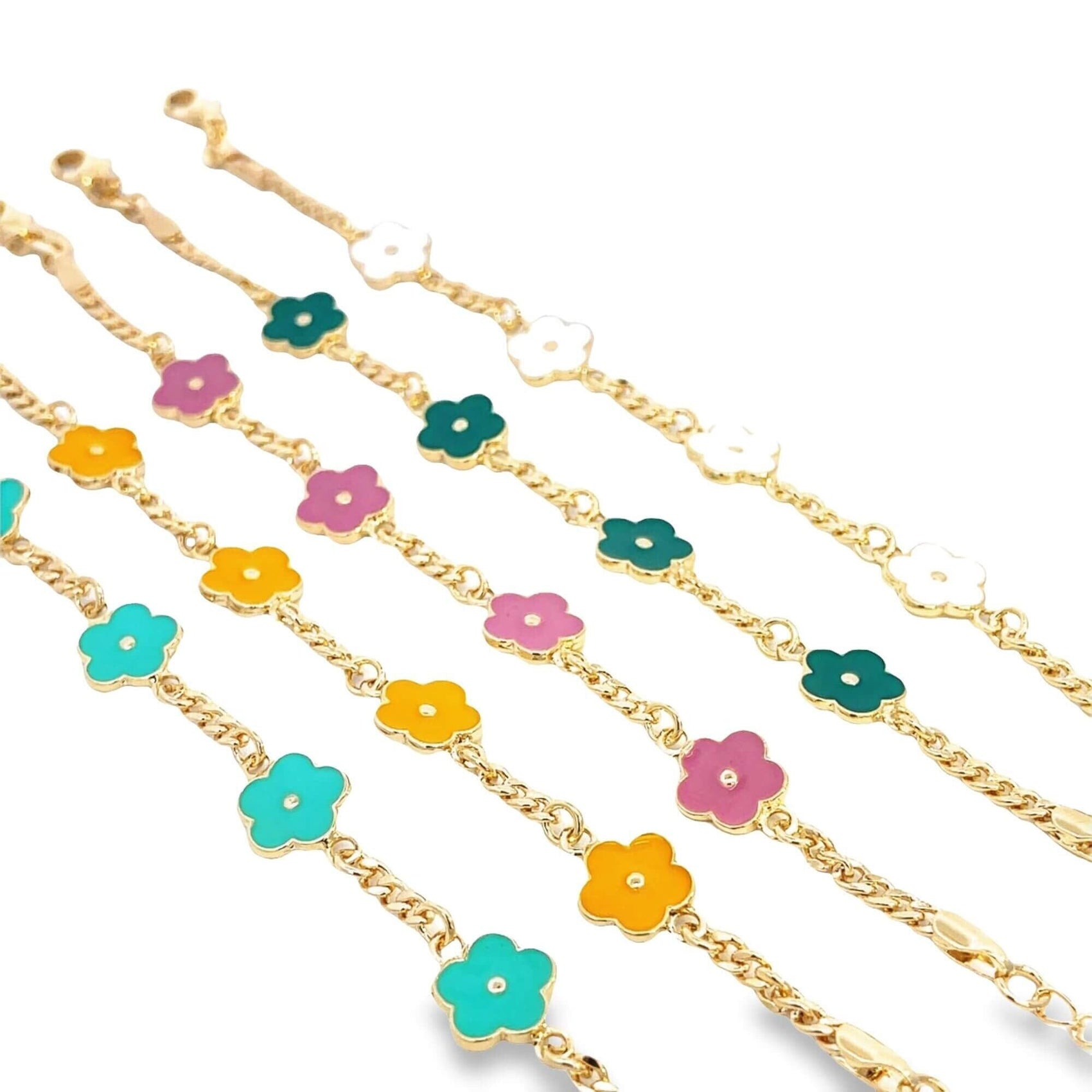 Four delicate gold chain bracelets feature colorful enamel flower charms in white, dark green, pink, yellow, and turquoise against a white background.