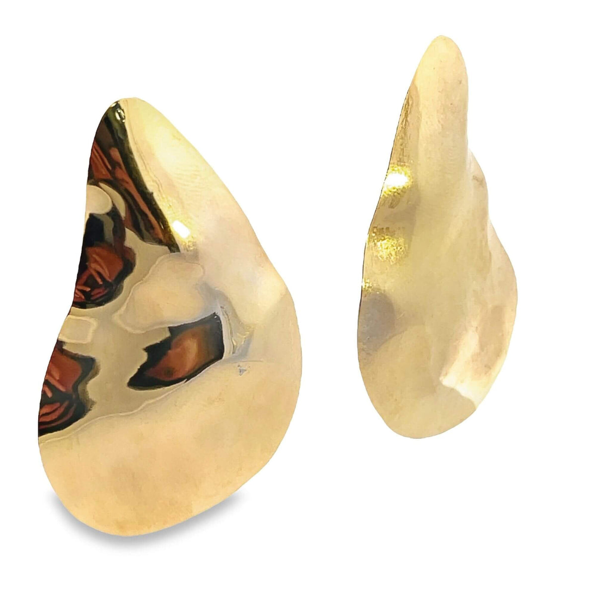 A pair of glossy, abstract gold earrings displays smooth, organic teardrop shapes against a white background.