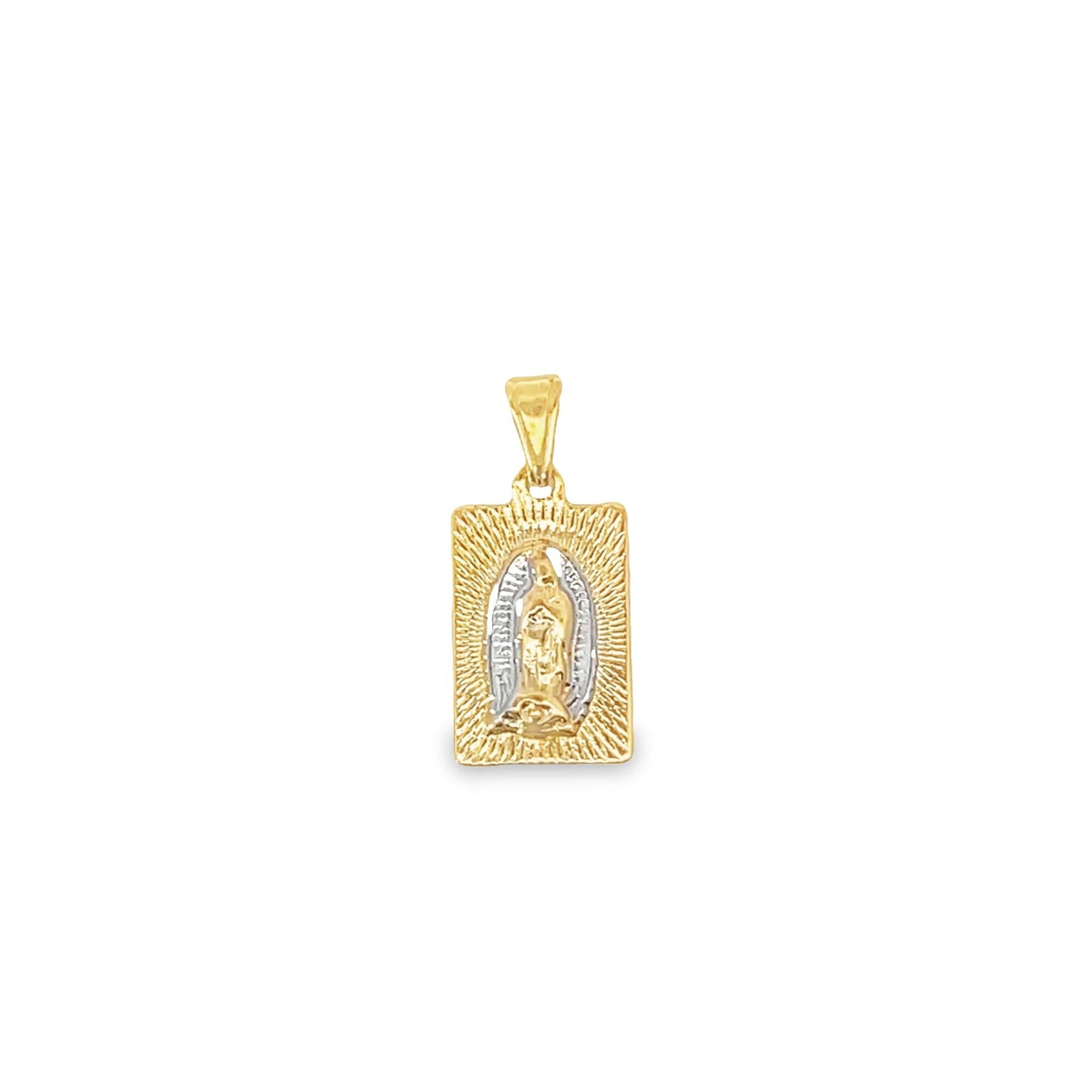 A two-tone gold rectangular pendant features a detailed engraving of Our Lady of Guadalupe surrounded by radiating sunburst rays.