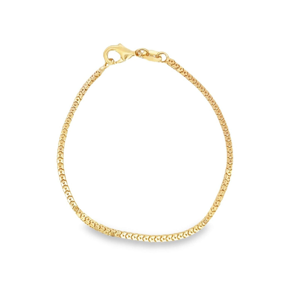 A delicate gold chain bracelet features a secure lobster clasp against a plain white background.