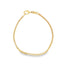 A delicate gold chain bracelet features a secure lobster clasp against a plain white background.