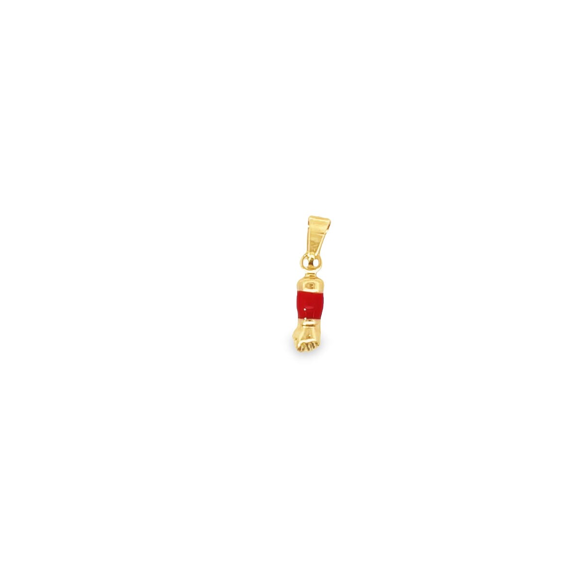 A gold pendant shaped like a clenched fist features a vibrant red enamel band around the forearm.