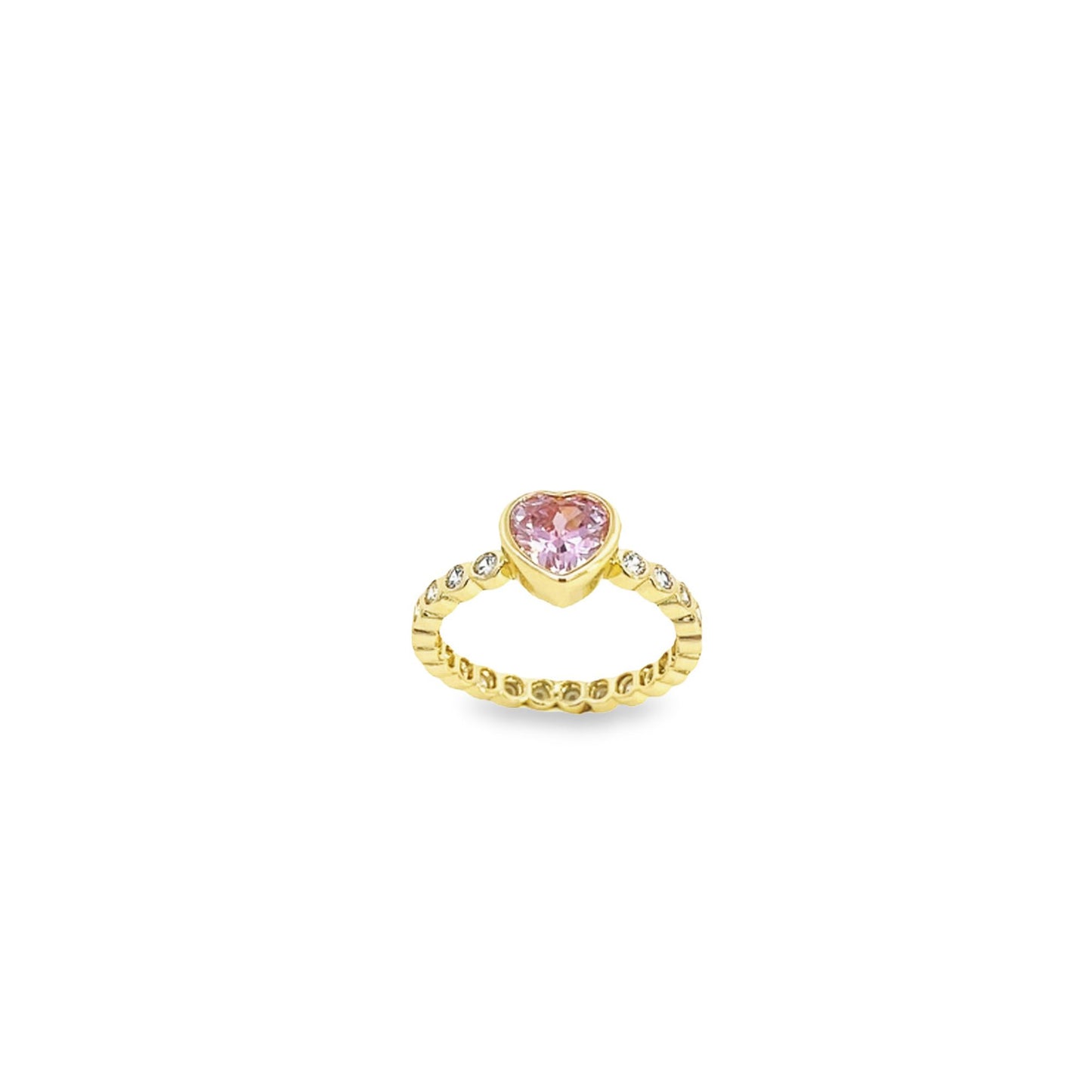 A gold ring features a sparkling pink heart-shaped center stone and diamond accents along the band.